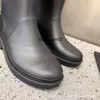 Chaneles Botas Wind na altura do joelho para mulheres Moda Outwear Botas de cavaleiro impermeáveis e antiderrapantes para mulheres Botas de comprimento médio Botas de chuva antigas