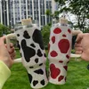 Water Bottles 40oz Glitter Tumbler with Handle Cow Printed Diamond Tumbler Insulated Cup Reusable Stainless Steel Water Bottle Travel Mug YQ240221