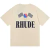 Designer rhude T-shirt da uomo Chaopai Rhude Micro Etichetta Lettera Bandiera Stampa T-shirt a maniche corte per uomini e donne Coppie High Street Loose Half