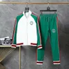 Conjunto deportivo marca de lujo chaqueta de diseñador para mujer y hombre pantalón deportivo conjunto de dos piezas con bordados para hombre y mujer tallas M-XXXL