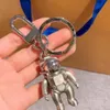 3D stereo astronauta robot kosmiczny liter mody srebrny metalowy brelok do samochodu reklama talia łańcucha kluczowego łańcucha