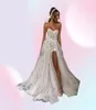 2021 Sexy Beach Wedding Suknie dla panny młodej Eleganckie koronkowe boho suknie ślubne bez rąk bez rękawów wysokie rozłam księżniczki małżeństwo 5553987