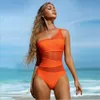 Swimwear féminin Soild One Piece Swimsuit Nouvelle femelle Hollow Out Mesh Transparent Bathing mail