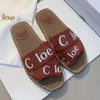 Designer-Hausschuhe Hausschuhe Sandalen Flache Holzpantoletten Die mit dem O-Logo der Marke verzierte Innensohle Das schlichte Design macht diese flachen, klassischen und stilvollen Holzsohlen aus