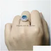 Pierścienie klastra Wysokiej jakości niebieska cyrkon miedziana obrączka dla kobiet przezroczyste kamień urodzinowy okrągły platynowy elegancki prezent biżuterii upuść dhhcx