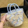 2024SS Sac de plage seau à nœud papillon à la mode pour femmes, fourre-tout en Crochet ajouré, panier de légumes tissé en paille fait à la main, sac de vacances d'été avec cordon de serrage, petit sac