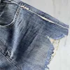 Tidig vår kvinnors shorts modebrev broderi nödställda tvättade denim shorts designer byxor kvinnor blå a-line heta byxor 3kup