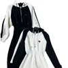 Grundlegende Freizeitkleider Designermarke 2024 Frühjahr Neues Pra Fashion Color Block Elastische Taille Half Zip Hooded Space Cotton Dress OBVW