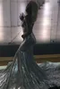 Fantastisk Sparkle Silver-paljetter Mermaid Prom Dresses Sexig Deep V-ringar rygglösa långa aftonklänningar med spaghettirem Vestidos