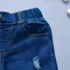 Jeans barns jeans barnkläder vår- och höstsäsonger mångsidiga flickor raka ben perforerade casual pojkar byxor