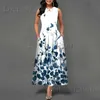 Basic casual jurken vrouwen zomer bloemen bedrukte jurk o nek mouwloze boho een lijn jurk casual dames pocket strand lange jurk sexy robe t240221