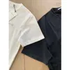 Designer di lusso Alexander King Classic 23 T-shirt a maniche corte da uomo e da donna con stampa a labbra semplici a fila singola con lettere di diamanti brillanti