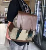 Mode mäns och kvinnors ryggsäckar casual väska läder stor kapacitet ryggsäck resväska datorväskor
