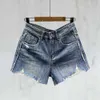 Vårkvinnors shorts modebrev broderi nödställda tvättade denim shorts designer byxor kvinnor blå a-line heta byxor