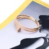 Nuovo braccialetto per unghie con fibbia originale intarsiato in zirconi di rame Gioielli personalizzati con diamanti placcati in oro