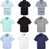 24 New Little Mens Womens Camisas Casuais Designers Camisa de Moda Ralphs Polos T-shirts Tees Tops Homem Camiseta Luxurys Roupas Manga Laurens Roupas 599ess