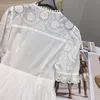 Robe femme Marque de mode européenne Coton blanc brodé pendentif perle creuse avec manches bouffantes taille froncée robe midi