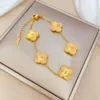 Pulseira de flor de trevo de quatro folhas banhada a ouro 18K de aço titânio para mulheres pulseira joias atacado