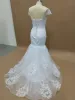 Romantische Spitze Meerjungfrau Brautkleider elegant vor Schulter Schatz Tüll Applizes Brautkleider Rückenless Robe de Mariage BC