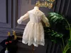 Flickans klänningar 2023 Ny vår Autumn 2-5y Baby Girls Lace Dress Children Long-Sleeved Super Fairy Princess Dresses