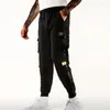 Mäns byxor Loose Fit Multi Pocket Joggers för Spring Summer Street Drawstring Casual Cargo Fitness