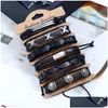 Bracelets de charme Skl Bracelets Bijoux Véritable Cuir Noir Bracelet Pour Femmes Hommes Wrap Mtilayer Main Corde Chaînes Mode Alliage Croix B Dhdg9