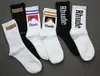 Rhude Men Socks Calcetines Women Designer Högkvalitativ Pure Cotton Comfort Brand Representativ Deodorisering Absorb Sweat Let In Luft Strumpor Black Maelove963