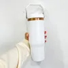 Kina lagerpulverbelagd laser graverad 30oz matt blandad färg kopparguldpläterad drickande tumlers utomhus sport vatten flaska med läcktät flip halm