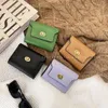 Koreaanse versie van de nieuwe portemonnee Japan en Zuid-Korea Lady Lock Multi-card Bag Ins Student Effen kleur Eenvoudig en klein