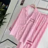 Kvinnors spårningsdräkter designer Spring Autumn New Ice Silk Jacquard Pyjamas Women's Printed Cardigan Brand Satin Home Fury Long Sleeve Set