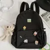 Sacs d'école dames Nylon mignon sac à dos ours fille sac Badge poupée tendance de la mode