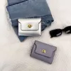 Koreaanse versie van de nieuwe portemonnee Japan en Zuid-Korea Lady Lock Multi-card Bag Ins Student Effen kleur Eenvoudig en klein