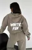 Beyaz tilki tasarımcısı beyaz tilki kapşonlu set kadın iki 2 adet set kadın mektup köpük set sportif kazak kapüşonlu tasarımcılar four Seasons Trailsuit Man 879