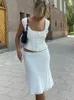 Arbetsklänningar ruffle tank top och knälängd kjolar streetwear matchning set vita två stycken kvinnor sommarkläder spetsar spetsar