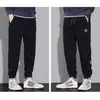 Pantalons pour hommes Hommes Casual Plus Taille 5XL Solide Corduroy Crayon Pantalon Mâle Lâche Ins Chic Taille Élastique Tendance Style Coréen Streetwear