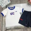 Survêtements de luxe pour enfants Ensemble de T-shirts pour bébé avec bordure bleue Taille 100-150 CM Manches courtes d'été et short doublé en maille 24Feb20