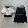 Reversoverhemd Hoog getailleerde rok Tweedelige set Designer Shirtjasje met metalen afwerking Draag een riem Zomer Dames A-lijnjurk