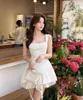 カジュアルドレス韓国の穏やかなスリムフィット女性の短いドレス2024夏のセクシーなファッションスイートハイウエストノースリーブスクエアカラーa-ライン