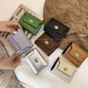 Koreaanse versie van de nieuwe portemonnee Japan en Zuid-Korea Lady Lock Multi-card Bag Ins Student Effen kleur Eenvoudig en klein