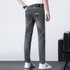 Mode lente heren slanke elastische jeans bij borduurwerk zakelijke denim broek klassieke stijl