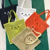 Borsa a tracolla firmata da donna in rafia estiva da spiaggia rosa bianca Borsa tote all'uncinetto borsa da viaggio in tessuto Borse di lusso Borsa da uomo in rattan CrossBody Borsa da weekend da viaggio