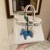 Bolsa feminina bk novo couro de alta capacidade camada superior bolsa de ombro único ouro vaca couro das mulheres crossbody saco na moda fivela l