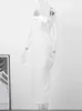 Robes décontractées de base Robe sans bretelles à la mode et sexy pour femmes Robe midi blanche avec corps dos nu et sans manches 2024 Mode féminine Nouvelle fête J240222
