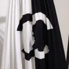 شانيلز مصمم قناة فاخرة كلاسيكية نسائية بوهيميا فستان أنثى تنورة رجعية لاديس أزياء مرنة الخصر 60-90 سم