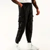 Calças masculinas soltas ajuste multi bolso joggers para primavera verão rua cordão casual carga fitness