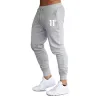 Pantaloni vendita calda solido casual uomo casual slim fit tuta sportiva solido maschio palestra cotone skinny jogging pantaloni casual pantaloni