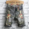 Gestapelte Jeans Männer neue Sommer -Denim Shorts Herren Persönlichkeit Patch Retro Chic Herren Viertel Hosen Herrengerissene Shorts