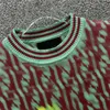 Tasarımcı Sweater Kadın Sweaters Kadın Kısa Kollu Gömlek 2024 İlkbahar ve Yaz Yeni Jakard Mektup Yuvarlak Boyun Örtü Kadın Moda için Üst Lüks Sweater