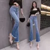 Kvinnors jeansbyxor för kvinnor blossar blossade hög midja s kvinnor klocka botten blå byxor 2024 koreansk stil toppsäljning till försäljning hippie