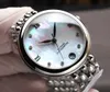Estilo de gota de agua Reloj de moda para mujer Espejo de zafiro de alta calidad 300 m Reloj de diseñador para mujer resistente al agua con caja